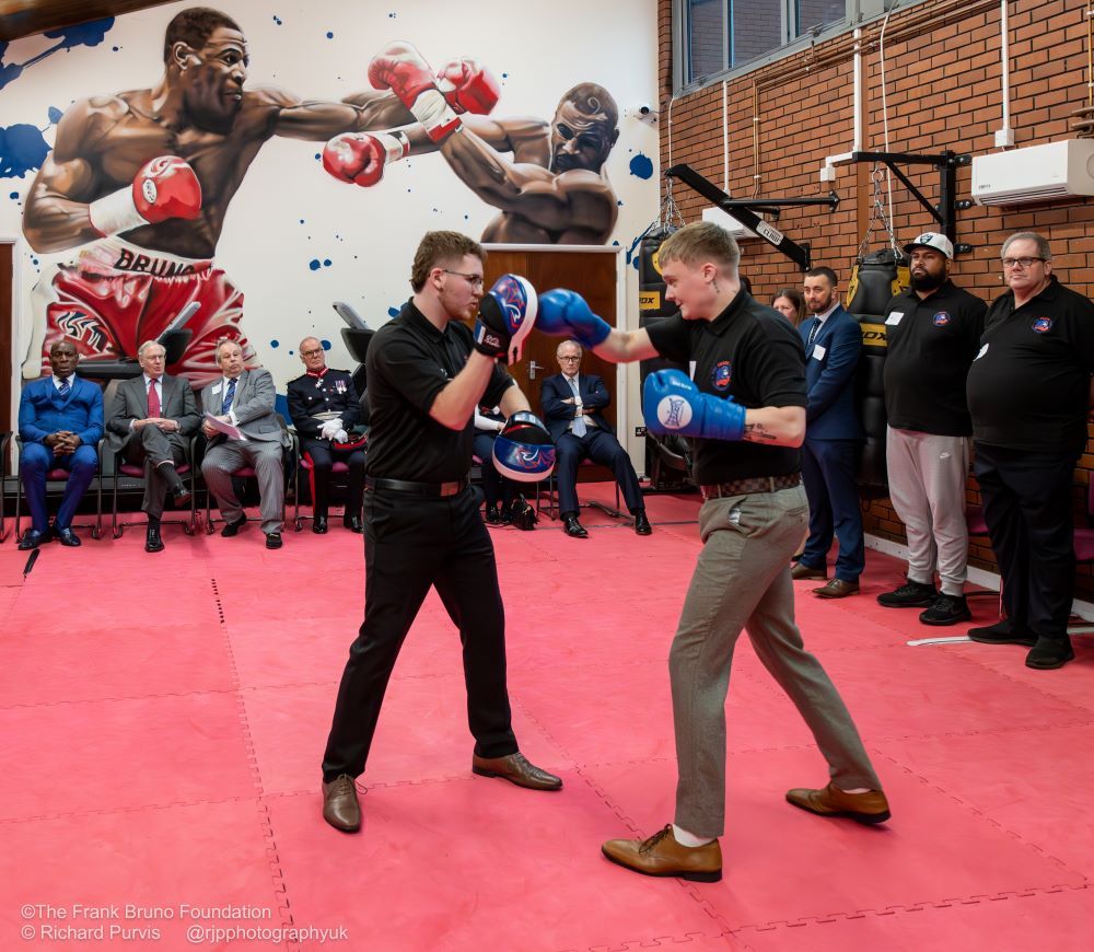 HRH The Duke of Gloucester watching a boxing demonstration