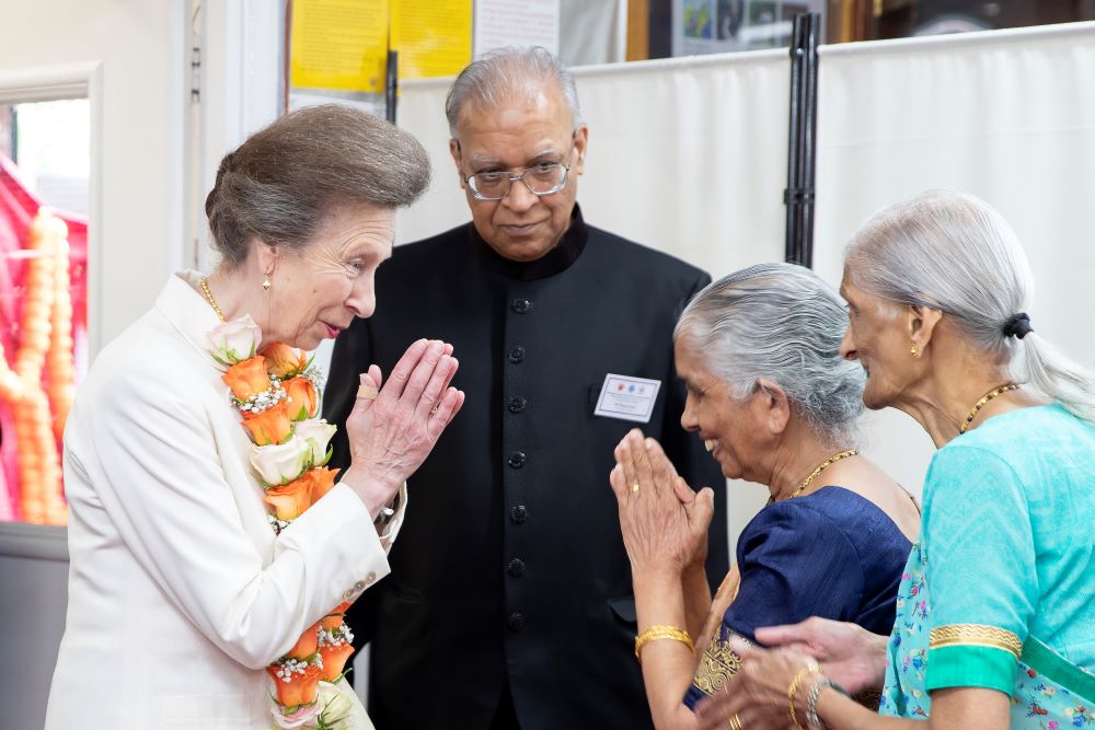 HRH being garlanded by Mrs Vijaya M Mistry, wife of one of the founder of the Sanatan Hindu Mandir HRH The Princess Royal Visit to Wellingborough District Hindu Association 17 July 2025